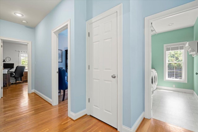 143 Winding View Trl, Georgetown, KY 40324 - corridor with independent washer and dryer, an office area, healthy amount of natural light, and light wood-type flooring