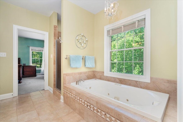 143 Winding View Trl, Georgetown, KY 40324 - full bathroom with a tub with jets, a shower stall, a chandelier, and tile patterned floors