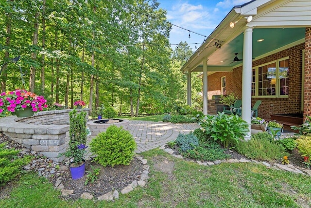 143 Winding View Trl, Georgetown, KY 40324 - view of yard featuring an outdoor fire pit, ceiling fan, and a patio
