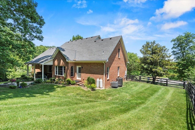143 Winding View Trl, Georgetown, KY 40324 - back of property with brick siding, a fenced backyard, and a shingled roof