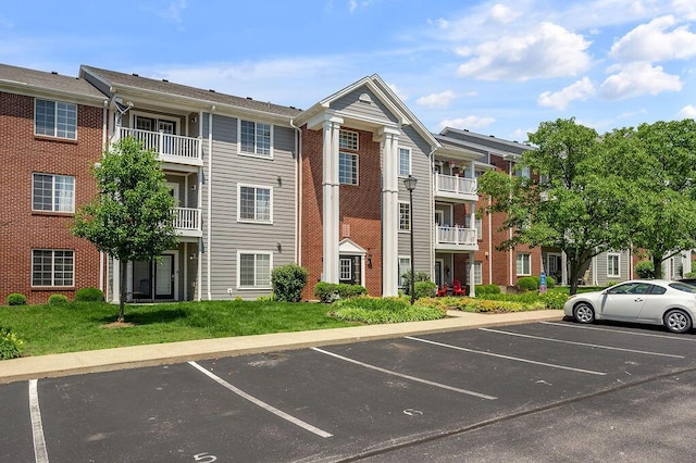 2312 Remington Way Unit 1203, Lexington, KY 40511 - view of building exterior featuring uncovered parking