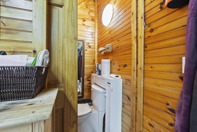 106 Sand Piper Ct, Midway, KY 40347 - washroom featuring separate washer and dryer and wood walls