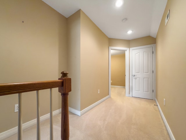 2625 Flying Ebony Dr, Lexington, KY 40509 - corridor featuring light colored carpet, baseboards, recessed lighting, and an upstairs landing