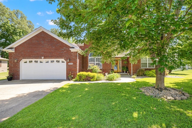 204 Keith Dr, Berea, KY 40403 - view of property hidden behind natural elements featuring a front yard, driveway, an attached garage, and brick siding