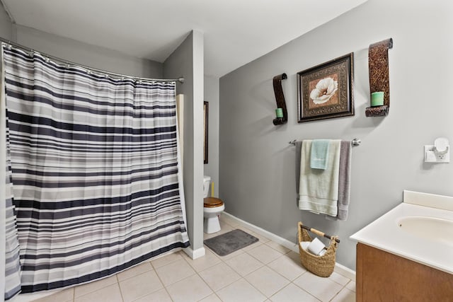204 Keith Dr, Berea, KY 40403 - full bath with toilet, vanity, tile patterned flooring, baseboards, and a shower with shower curtain