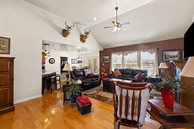 204 Keith Dr, Berea, KY 40403 - living room with hardwood / wood-style floors, a ceiling fan, high vaulted ceiling, and baseboards