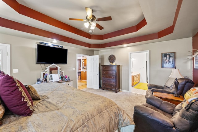 204 Keith Dr, Berea, KY 40403 - bedroom with ensuite bath, light colored carpet, a raised ceiling, and a ceiling fan