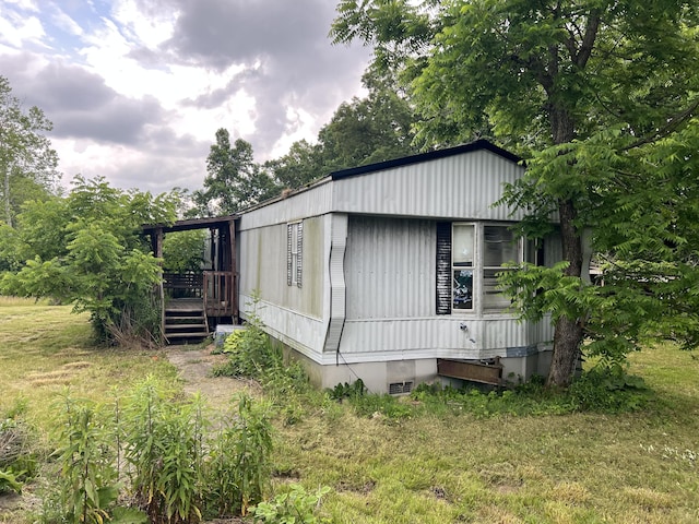 165 Gentry Laswell Rd, Brodhead, KY 40409 - view of side of property with a wooden deck and a yard
