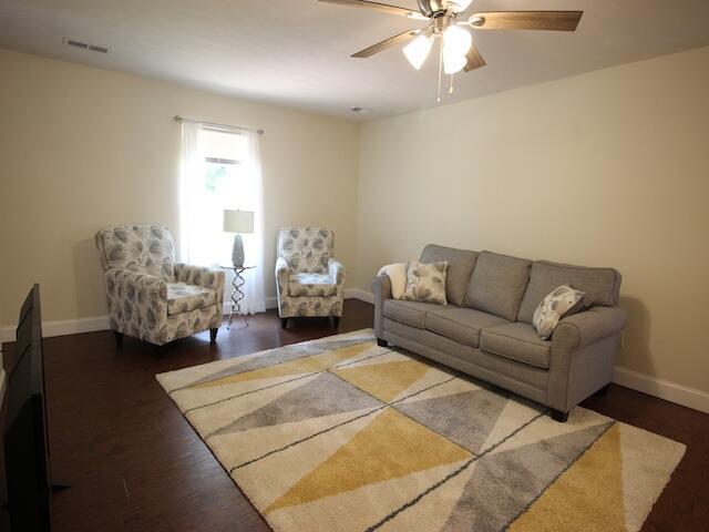 91 Graysons Way, Somerset, KY 42503 - living area with ceiling fan, baseboards, and wood finished floors