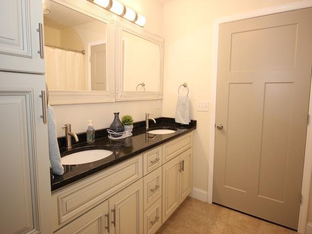 91 Graysons Way, Somerset, KY 42503 - full bath with double vanity, tile patterned floors, a shower with curtain, and baseboards