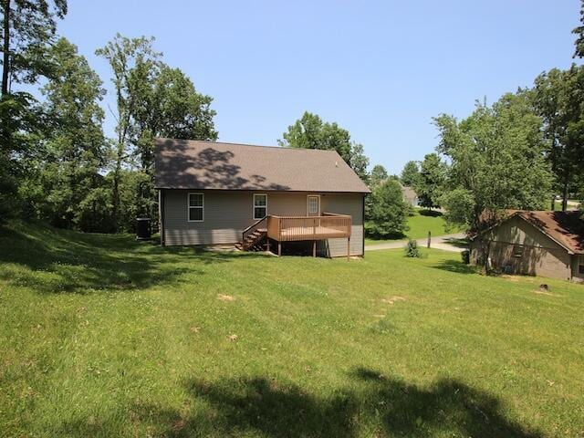 91 Graysons Way, Somerset, KY 42503 - back of property with a wooden deck, a yard, stairway, and central air condition unit