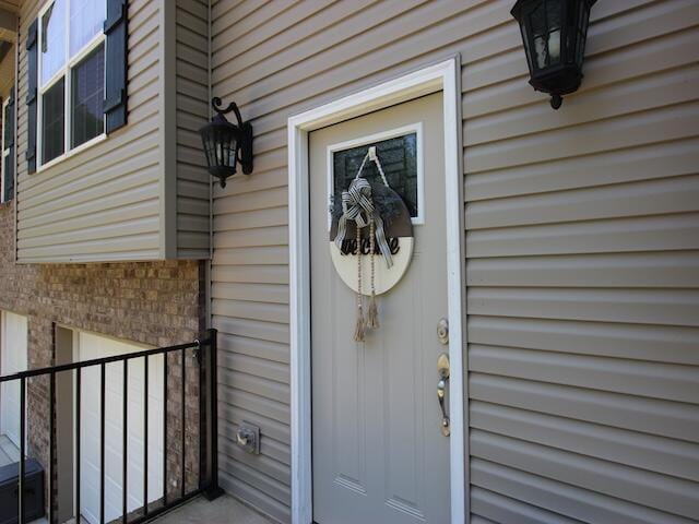 91 Graysons Way, Somerset, KY 42503 - doorway to property featuring brick siding