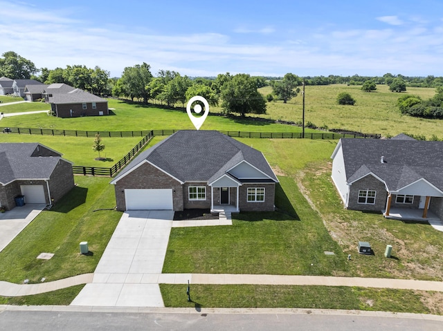 202 Max Cavnes Rd, Danville, KY 40422 - view of front of house featuring driveway, an attached garage, and brick siding