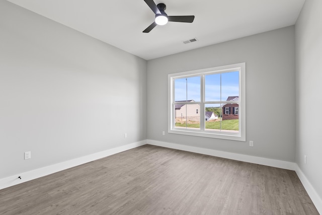 202 Max Cavnes Rd, Danville, KY 40422 - spare room featuring wood finished floors and ceiling fan