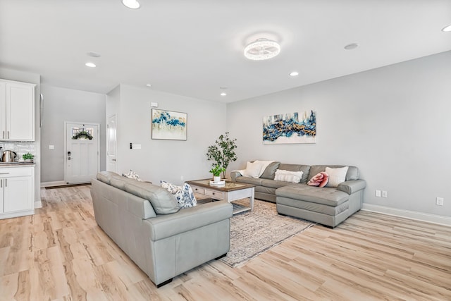 110 Kinglet Pt, Nicholasville, KY 40356 - living room with light wood finished floors, baseboards, and recessed lighting