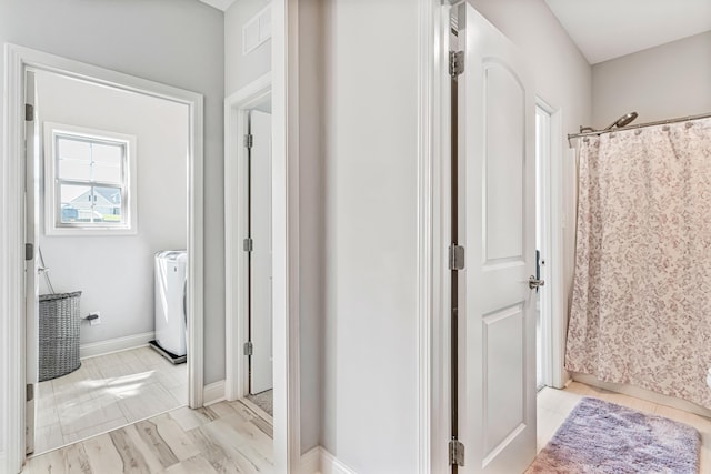 110 Kinglet Pt, Nicholasville, KY 40356 - full bath featuring washer / clothes dryer, baseboards, and a shower with curtain