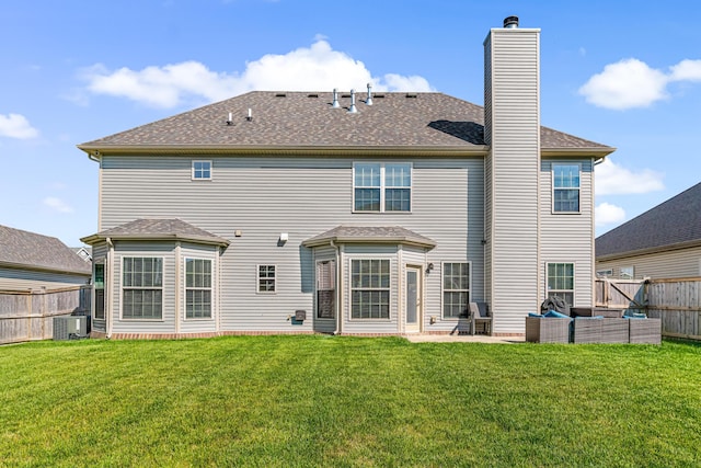 110 Kinglet Pt, Nicholasville, KY 40356 - rear view of house with central AC, a patio area, a chimney, an outdoor hangout area, and a shingled roof
