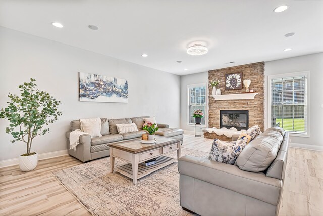 110 Kinglet Pt, Nicholasville, KY 40356 - living area featuring light wood-style floors, baseboards, recessed lighting, and a fireplace
