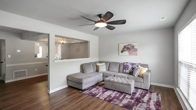 325 Houston Creek Dr, Paris, KY 40361 - living room featuring ceiling fan, wood finished floors, baseboards, and a chandelier