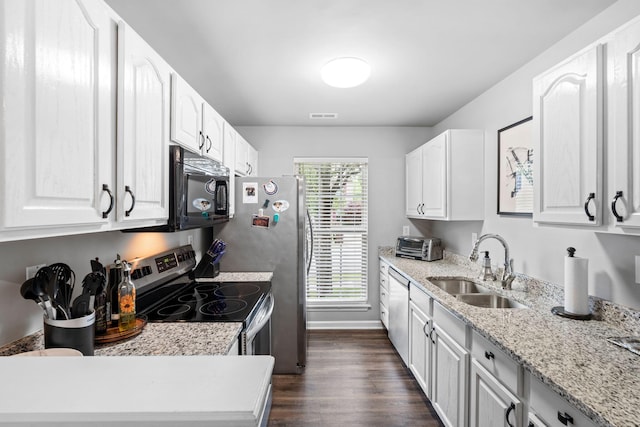 325 Houston Creek Dr, Paris, KY 40361 - kitchen featuring appliances with stainless steel finishes, a sink, dark wood finished floors, and white cabinets
