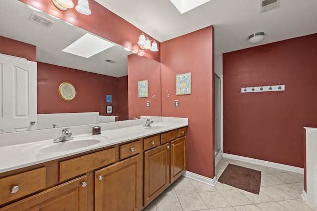 988 Fiddler Creek Way, Lexington, KY 40515 - bathroom featuring a skylight, double vanity, a shower stall, and tile patterned flooring