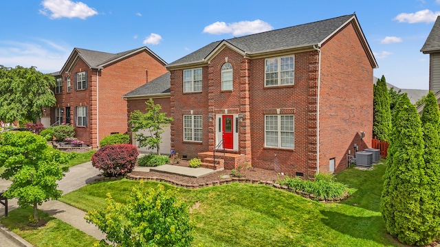 988 Fiddler Creek Way, Lexington, KY 40515 - colonial home featuring brick siding, a front yard, and cooling unit