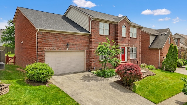988 Fiddler Creek Way, Lexington, KY 40515 - view of front facade featuring concrete driveway, a garage, brick siding, and roof with shingles