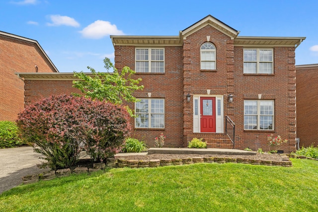 988 Fiddler Creek Way, Lexington, KY 40515 - view of front of house with brick siding, a front yard, and entry steps