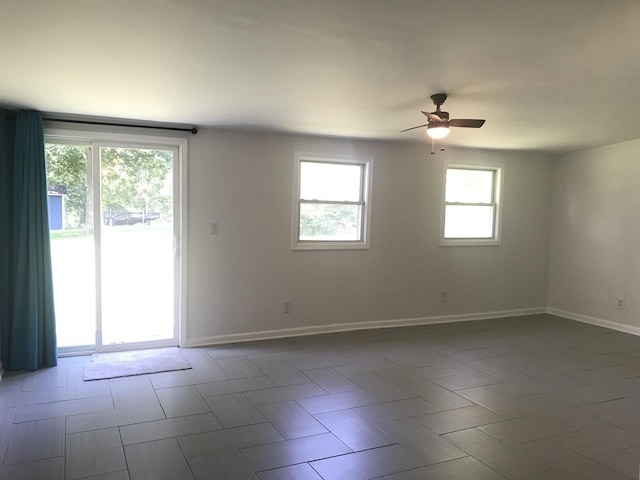 5713 Bybee Rd, Ashland, KY 41102 - spare room featuring a ceiling fan and baseboards