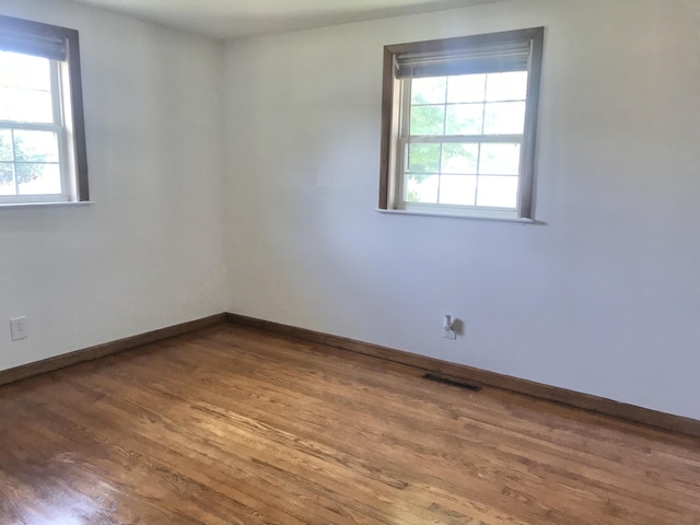 5713 Bybee Rd, Ashland, KY 41102 - unfurnished room featuring wood finished floors and baseboards