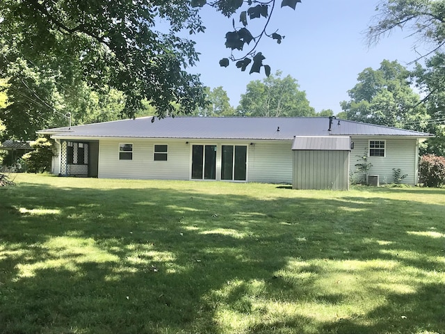 5713 Bybee Rd, Ashland, KY 41102 - back of property with a lawn and metal roof