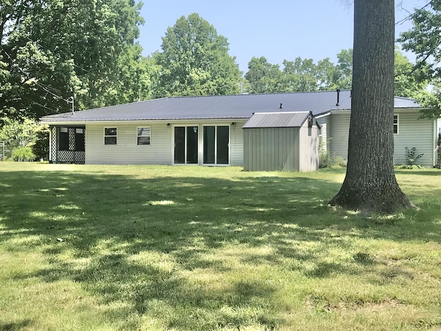 5713 Bybee Rd, Ashland, KY 41102 - rear view of property featuring a lawn and metal roof