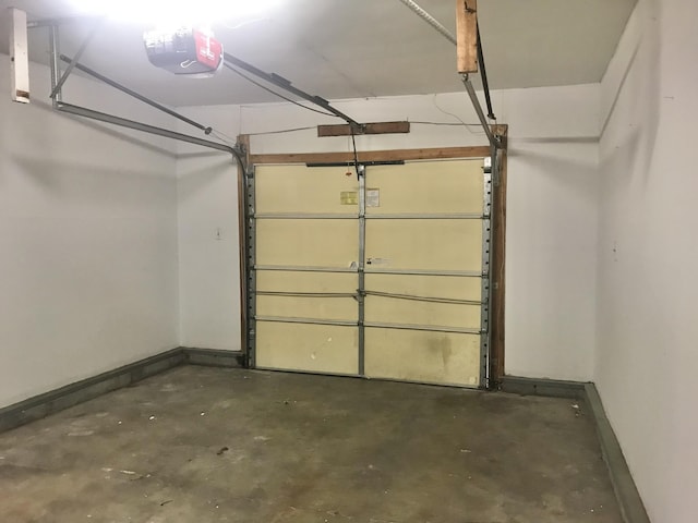 5713 Bybee Rd, Ashland, KY 41102 - garage with a garage door opener and baseboards