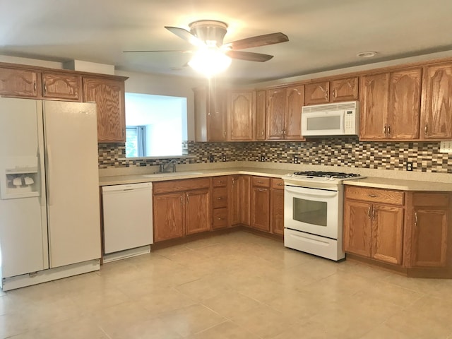 5713 Bybee Rd, Ashland, KY 41102 - kitchen with white appliances, a sink, light countertops, and decorative backsplash