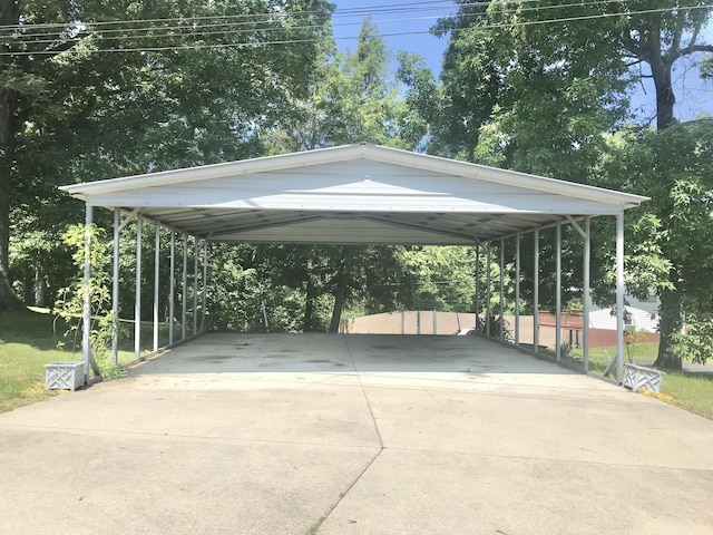 5713 Bybee Rd, Ashland, KY 41102 - view of parking / parking lot featuring driveway and a carport