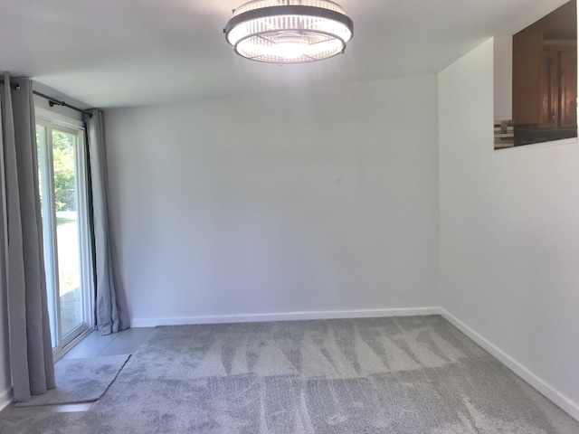 5713 Bybee Rd, Ashland, KY 41102 - spare room featuring baseboards and carpet flooring
