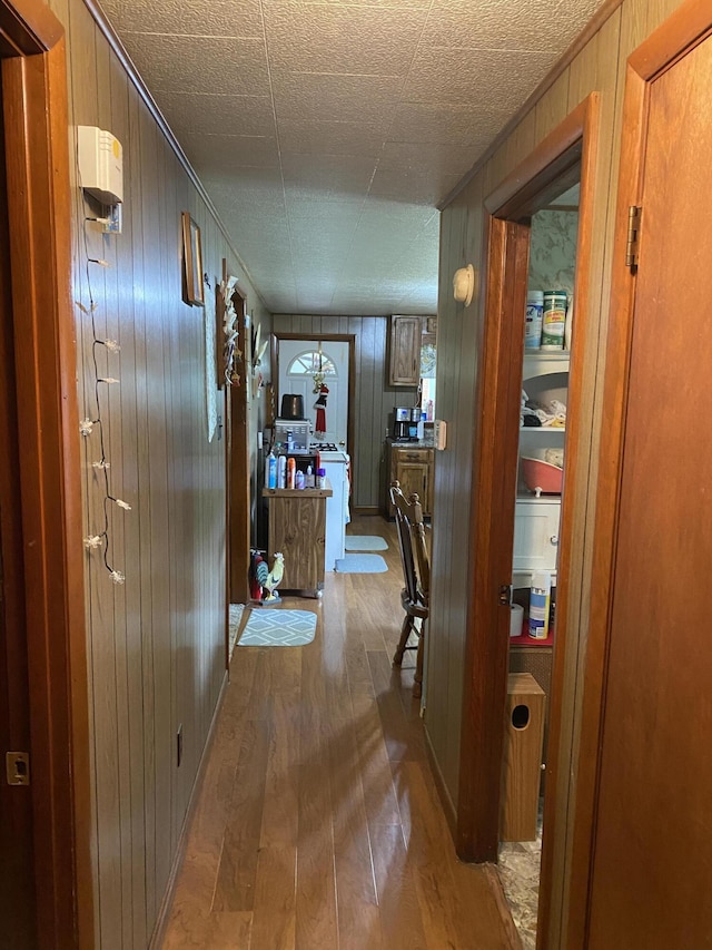 648 Hayes Creek Rd, Strunk, KY 42649 - corridor with hardwood / wood-style flooring and wooden walls