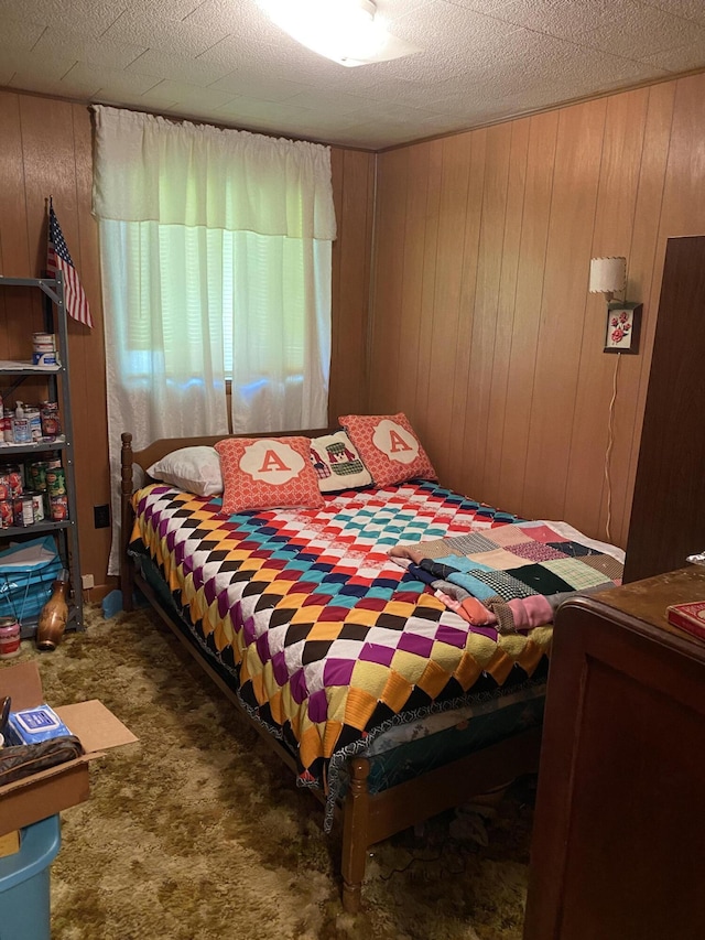 648 Hayes Creek Rd, Strunk, KY 42649 - carpeted bedroom featuring wooden walls