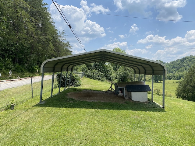 648 Hayes Creek Rd, Strunk, KY 42649 - view of parking featuring a carport