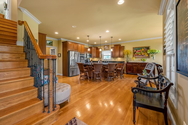 101 Sand Piper Ct, Midway, KY 40347 - dining room featuring crown molding, stairway, recessed lighting, and light wood-style flooring