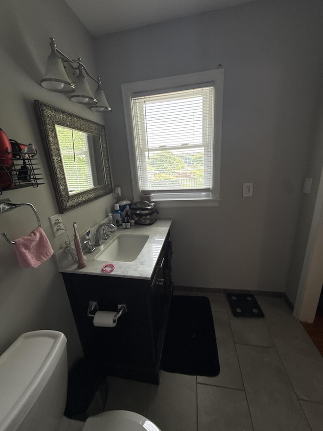 1021 Arapaho Trl, Frankfort, KY 40601 - bathroom with toilet, tile patterned floors, and vanity