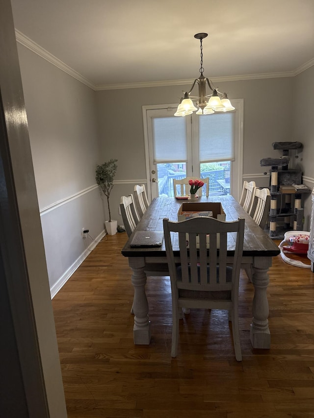 1021 Arapaho Trl, Frankfort, KY 40601 - dining room with a chandelier, dark wood-style floors, crown molding, and baseboards