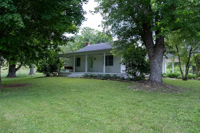 1987 White Rock Rd, Mount Vernon, KY 40456 - view of front of property with a porch, a chimney, and a front lawn