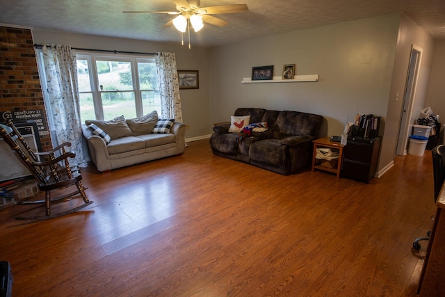 1987 White Rock Rd, Mount Vernon, KY 40456 - living area with wood finished floors, ceiling fan, a textured ceiling, and baseboards