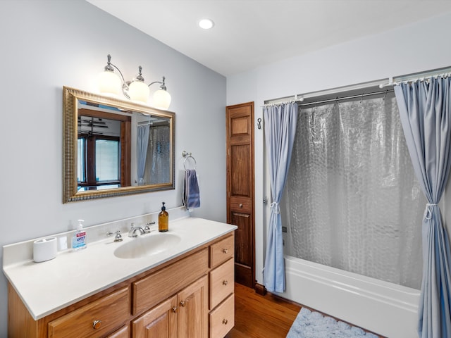 389 Lakeview Dr, Somerset, KY 42503 - bathroom featuring vanity, shower / bath combo with shower curtain, wood finished floors, and recessed lighting