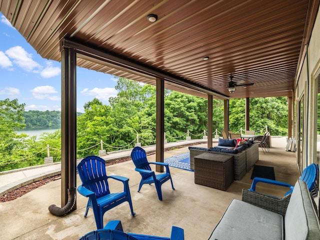 389 Lakeview Dr, Somerset, KY 42503 - view of patio / terrace featuring a water view, outdoor lounge area, view of wooded area, and ceiling fan