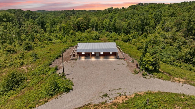 3402 Roundtop Rd, Strunk, KY 42649 - aerial view of property and surrounding area with a heavily wooded area