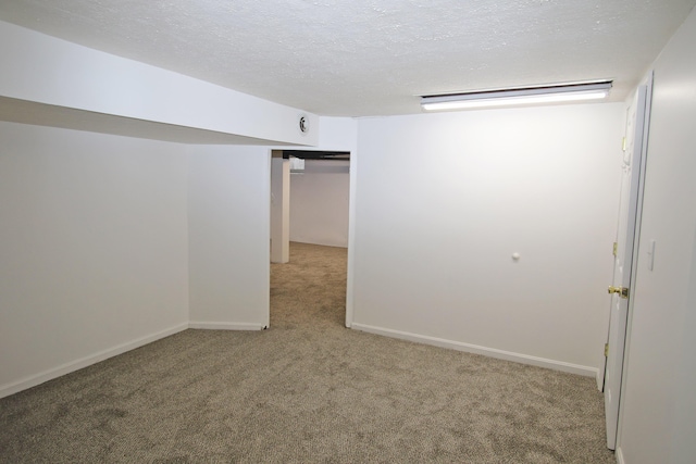 325 Dantzler Ct, Lexington, KY 40503 - empty room featuring carpet floors, a textured ceiling, and baseboards