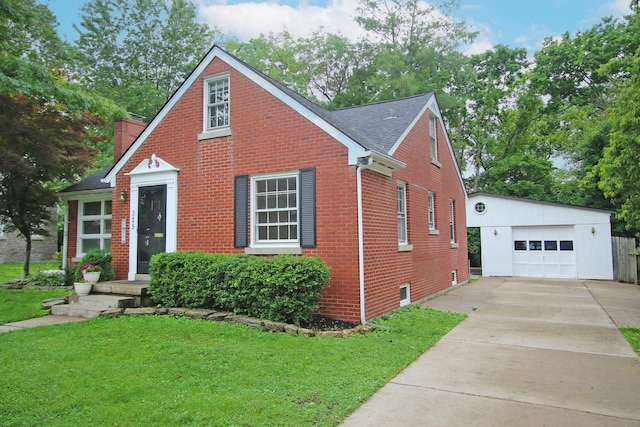 325 Dantzler Ct, Lexington, KY 40503 - view of front of home with an outdoor structure, brick siding, a chimney, a shingled roof, and a front lawn