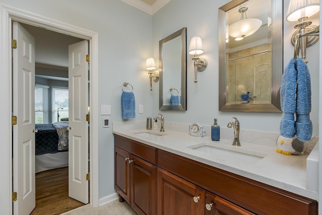 3513 Doral Pl, Lexington, KY 40509 - ensuite bathroom with double vanity, ornamental molding, tiled shower, and baseboards